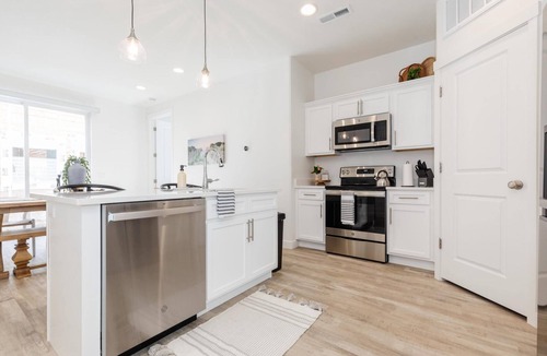 Garden City Villa | New Designer Townhome w Trailer Parking Games