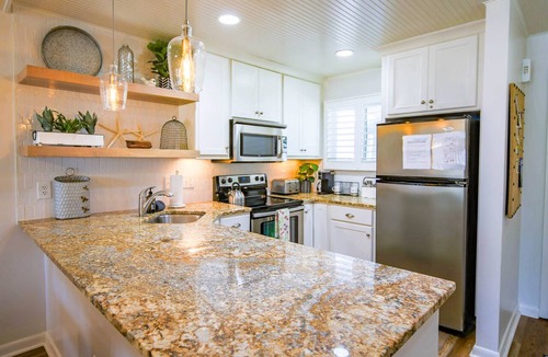 Isle of Palms Condo | Ocean Views! Wonderful Screened Porch w/Access to the Community Pool, Grills, Boardwalk & Beach!