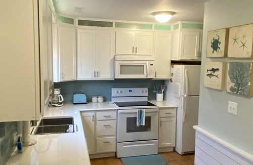 Pine Knoll Shores House | Oceanfront Townhome on semi private residential beach!