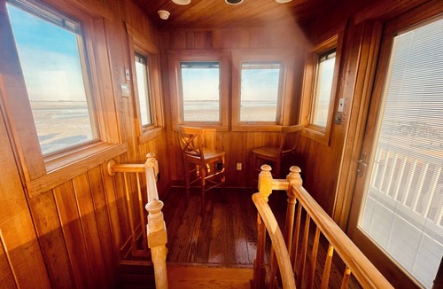 Fentress House | Peaceful Getaway At Bayfront Lighthouse. Escape To A Serene Destination.