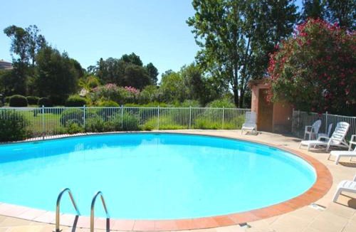 Pinarellu Apartment | Pinarellu Apartment Steps Away from Beach