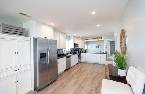 Grasonville House | Private Riverfront Home with Hot Tub, Kayaks, Paddleboards and Riverside Firepit