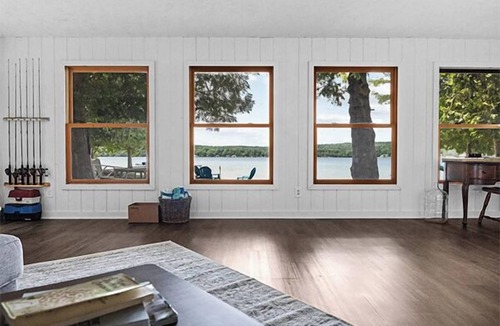 Central Lake Cottage | Private Sandy Beach, Dock, Kayaks, Canoe & Paddleboat | Sleeps 12 | Dog Friendly