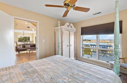 Isle of Palms House | Pure Bliss ! Dock with Fantastic Fishing, Deep Water 24 hours, 5 min Beach!
