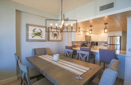 Isle of Palms Condo | Renovated Penthouse with Ocean Views, Community Pool, Kid Pool, Beach Access & Roof Deck