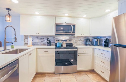 Isle of Palms Condo | Renovated Penthouse with Ocean Views, Community Pool, Kid Pool, Beach Access & Roof Deck