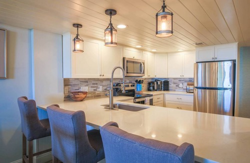 Isle of Palms Condo | Renovated Penthouse with Ocean Views, Community Pool, Kid Pool, Beach Access & Roof Deck