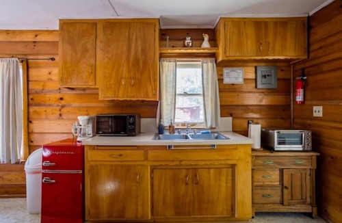 Lake Isabella Cabin | Rustic 1950s Cabins Located on 4 Acres of Pine Trees Surrounded by Upper Desert