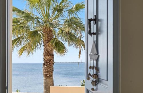 Perdhika Apartment | Seaside garden home with BBQ & sunset views