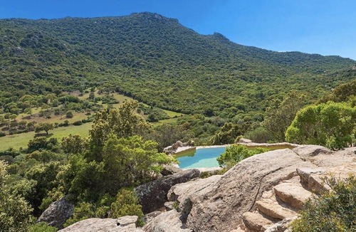 Figari House | Secluded, contemporary sheepfold for 2, nestled on a hillside with swimming pool.