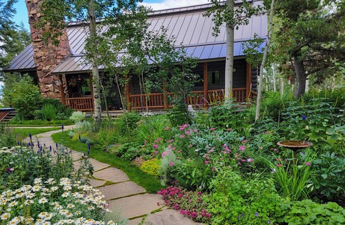 Jackson House | Secluded mountain-view home with large deck, hot tub & fireplace - dog-friendly