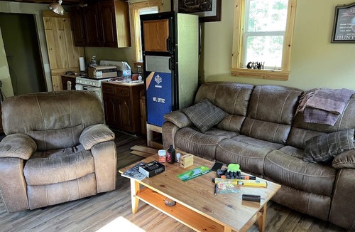 Scottown Cabin | Secluded Off-Grid Cabin with Waterfall & Hiking Trails Near Rome Township, OH