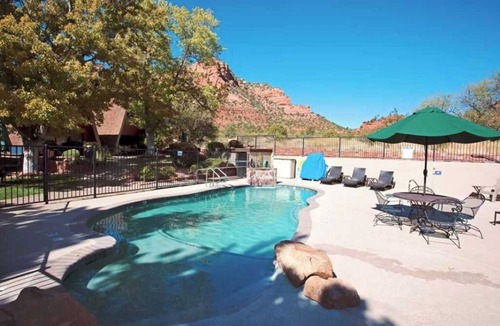 Oak Creek Ski Chalet | Sedona Chalet by pool with red rock views.
