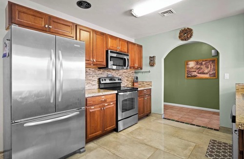 Tucson House | Serene 3BR retreat with Catalina Mountain views, shaded gazebo, BBQ grill & dog-friendly backyard.