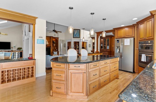 Sea Trail House | Shining Waters: Gorgeous waterfront home with private hot tub, pool, views, deck, & fireplace