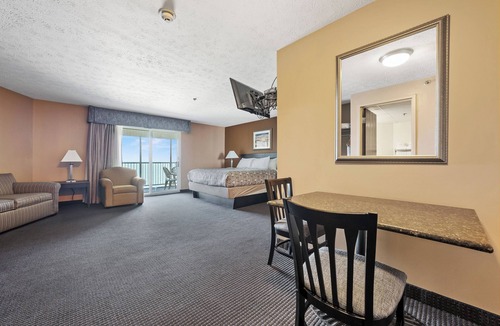 Put-in-Bay Hotel | Sleeps 4: King Suite with Sleeper Sofa and Lake View Balcony