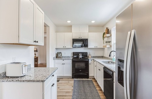 Wilmington House | Stylish 3 BR House: 1 King Bed. Centrally Located!