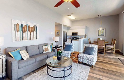North Ocean City Condo | Sunny Waterfront Condo w/Canal Views, Balcony, Central AC, Shared Pool & Tennis