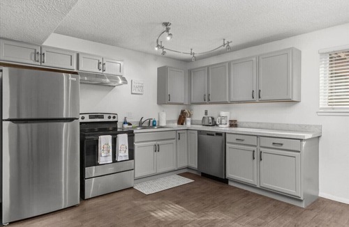 Hillcrest House | The Bunker | Garden-Level Retreat Pet Friendly Fenced Yard Fireplace Near Downtown & BSU