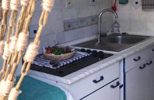 Poggio-Mezzana House | The feet in water