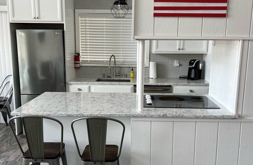 Soda Bay House | The Lake Cottage on Soda Bay-Pet Friendly, Private Deck, Dock & Kayaks