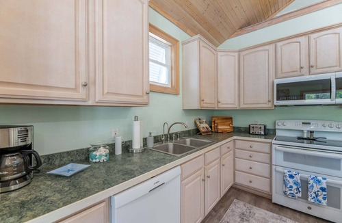 Carova Beach House | The Shore Bird - 4x4 Beach, Pool Table, Ping Pong, Pets OK, YR Flex Stays