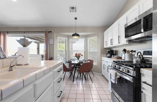 North Las Vegas House | The Ultimate 5BR Funhouse: Spa, Golf & Pool Table!
