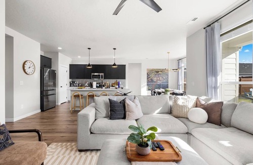 Southwest Ada County Alliance House | This 5-bedroom home has it all—gas fire pit for 8, hot tub, cornhole, ladder golf, ping pong, and a gas grill. Inside, enjoy a rock climbing wall, office desk, and a garage gym.