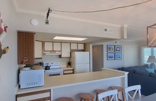 Midtown Ocean City Condo | Traditional, cozy 2 bedroom oceanfront condo with free WiFi, and outdoor pool, and an ocean view located in quiet midtown just steps from the beach!