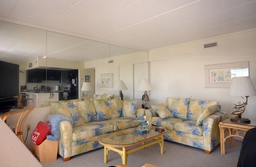 Midtown Ocean City Condo | Traditional, stylish 2 bedroom oceanfront condo with free WiFi, and outdoor pool, and a stunning ocean view located in quiet midtown near mini golf and bowling and just steps from the beach!