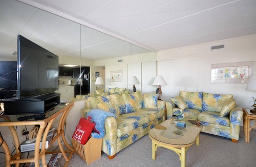 Midtown Ocean City Condo | Traditional, stylish 2 bedroom oceanfront condo with free WiFi, and outdoor pool, and a stunning ocean view located in quiet midtown near mini golf and bowling and just steps from the beach!