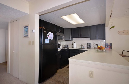 Midtown Ocean City Condo | Traditional, stylish 2 bedroom oceanfront condo with free WiFi, and outdoor pool, and a stunning ocean view located in quiet midtown near mini golf and bowling and just steps from the beach!