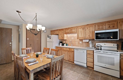 West Yellowstone House | Trapper 8: Cozy 4-Bedroom Condo, 1 Minute to Yellowstone, perfect for 8 guests.