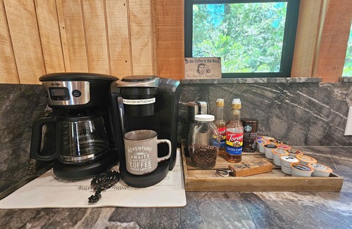 Sierra Cedars Cabin | Tucked in the trees, Cedar Hill is a cozy A-frame cabin with modern updates, a spacious kitchen, wraparound deck, and stunning views. The perfect mountain escape for families, couples, and friends—plus, it's pet-friendly!