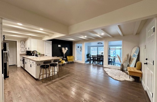 Southeast House | Ultimate Denver Getaway < Sleep 16 > Hot Tub, Fire Pit, Game Room & Home Gym