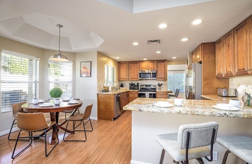 Paradise Valley Village House | Unbeatable location, fun game room, relaxing heated pool and spa, putting green!