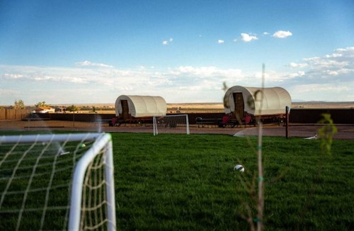 Colorado City RV Rental | Unique Covered Wagon Glamping with Shared Sauna