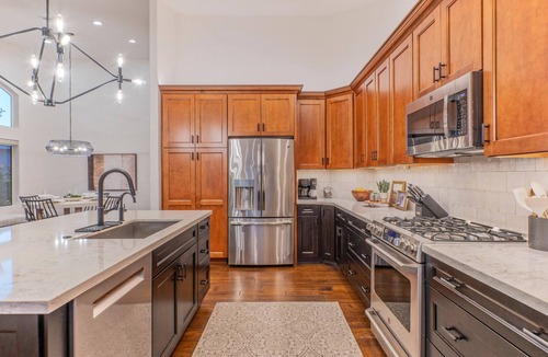 Crystal Shores House | Val Vista Lakefront Gem, Game Room, Htd Pool, Patio TV, Fire Pit, Kayaks, Bikes