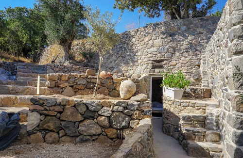 Mandraki House | villasglamp. Old Stone House in 2 000 sqm garden. Plunge pool. Sea Views.