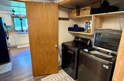 Evaro Apartment | Walk-In Creekside Apartment - Fireplace & Cozy Living Room