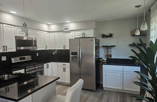 Harrison Township Condo | waterfront 2-bedroom condo with private deck overlooking Clinton River