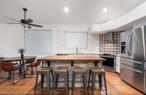 Fox Crossing Villa | Waterfront Villa with Pool Hot Tub Lounge area