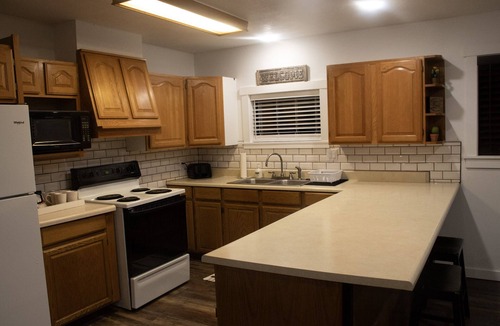 Salina House | Western Charm Getaway, Spacious 2BR Near I-70 in Salina. Single level no stairs