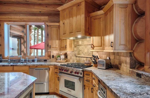 Marion House | Where lake days are long and everyone has a place to stay. Entire Estate property including the Large Custom Log Home and the Boat Motel on 50 Acres, Sleeping 26 Total