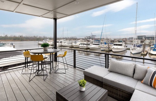 River District Boat Rental | Wilmington downtown stationary houseboat. Relax literally OVER the water 🐬