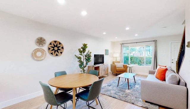 2-story dog-friendly condo with patio, outdoor pool, W/D, streaming, partial AC