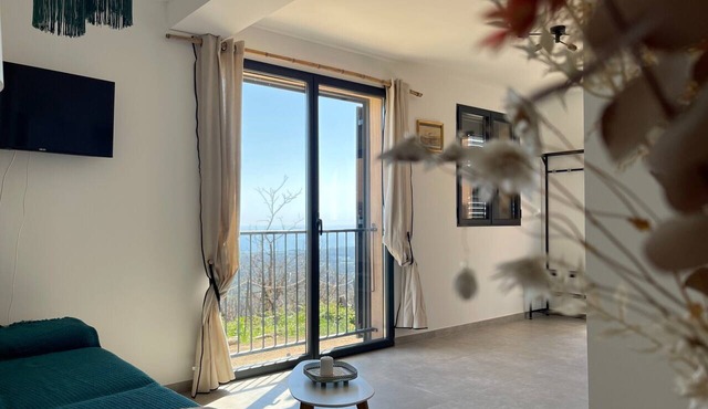 Apartment 'Nucciola' with Sea View, Private Garden, and Air Conditioning
