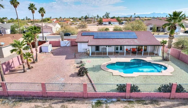 Arizona City golf course home with pool and RV parking, pets allowed!