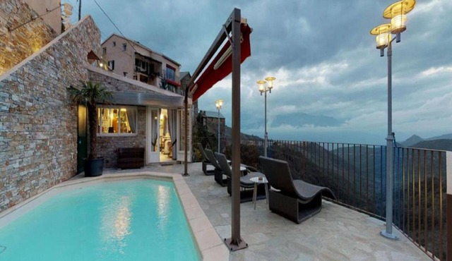 Attractive holiday home in Mazzola with sauna