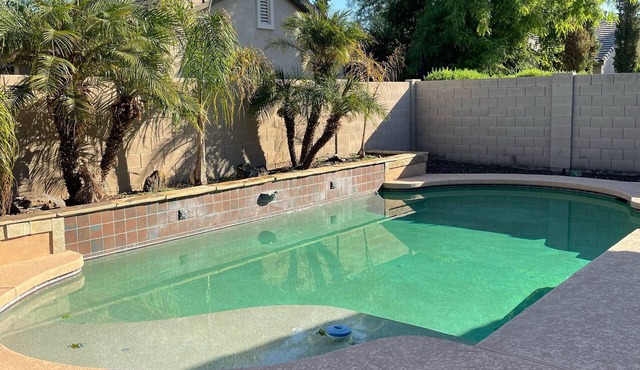 Beautiful, spacious home with pool & putting green, perfect for snow birds!